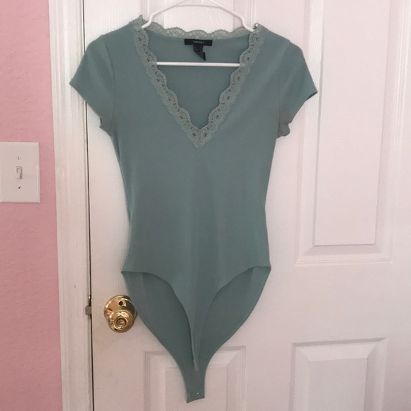 Forever 21 Tops - Forever 21 Teal bodysuit with lace v-cut.